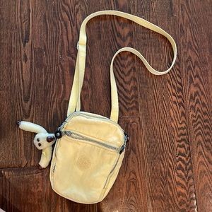small yellow Kipling crossbody